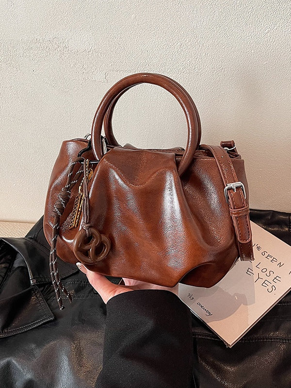 Borsa a tracolla leggera con motivo di nuvole plissettate