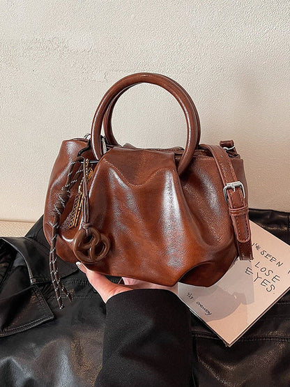 Borsa a tracolla leggera con motivo di nuvole plissettate