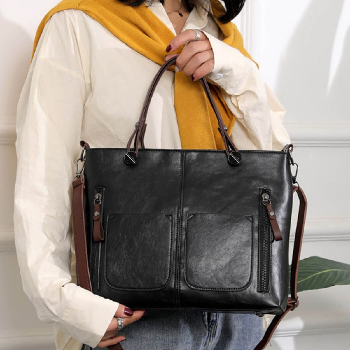 Borsa a tracolla con tasche multiple di Caterina