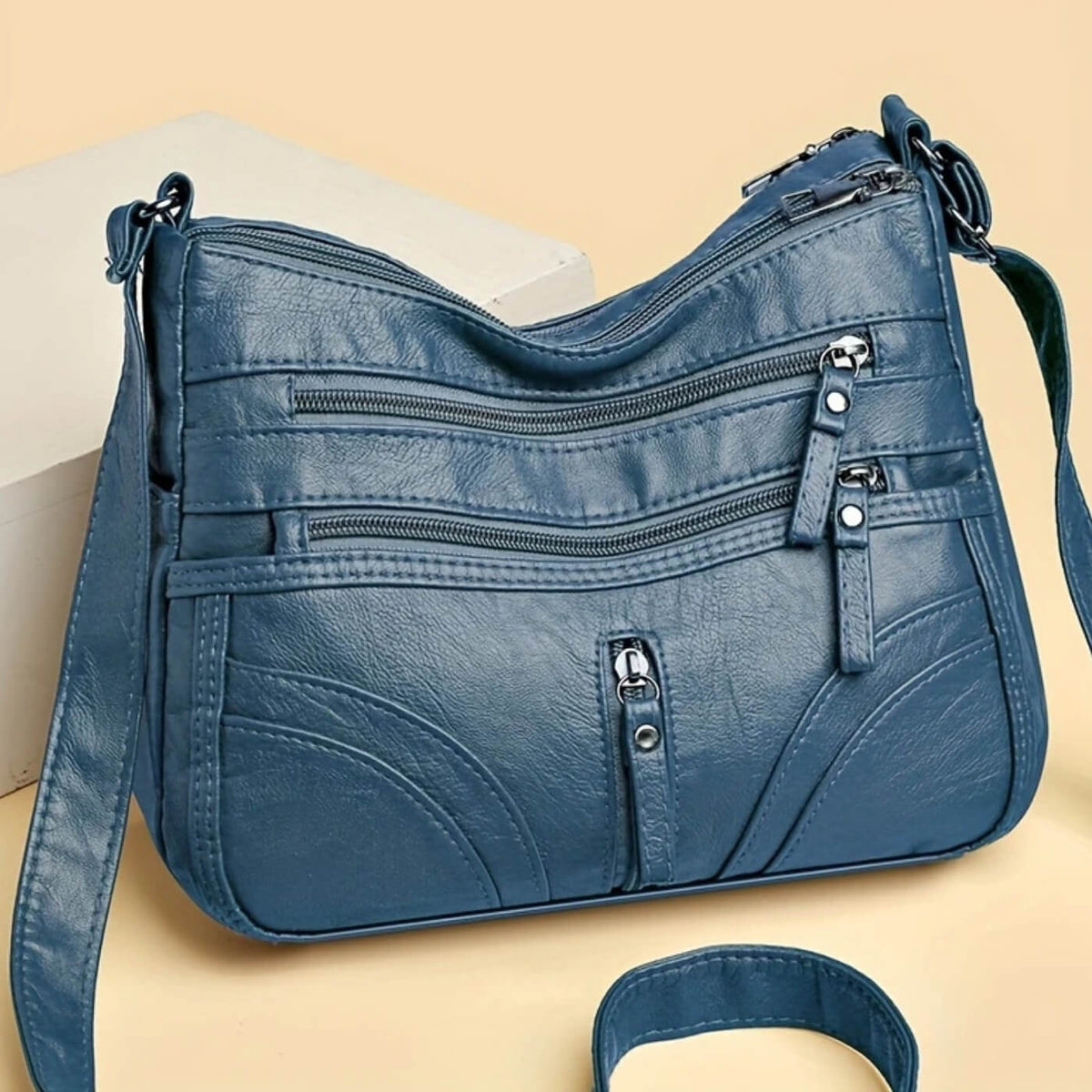 Borsa a tracolla con tasche multiple di Emanuela