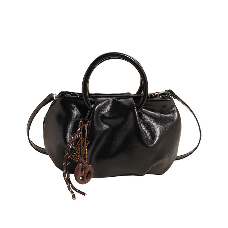 Borsa a tracolla leggera con motivo di nuvole plissettate