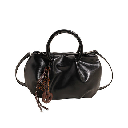 Borsa a tracolla leggera con motivo di nuvole plissettate