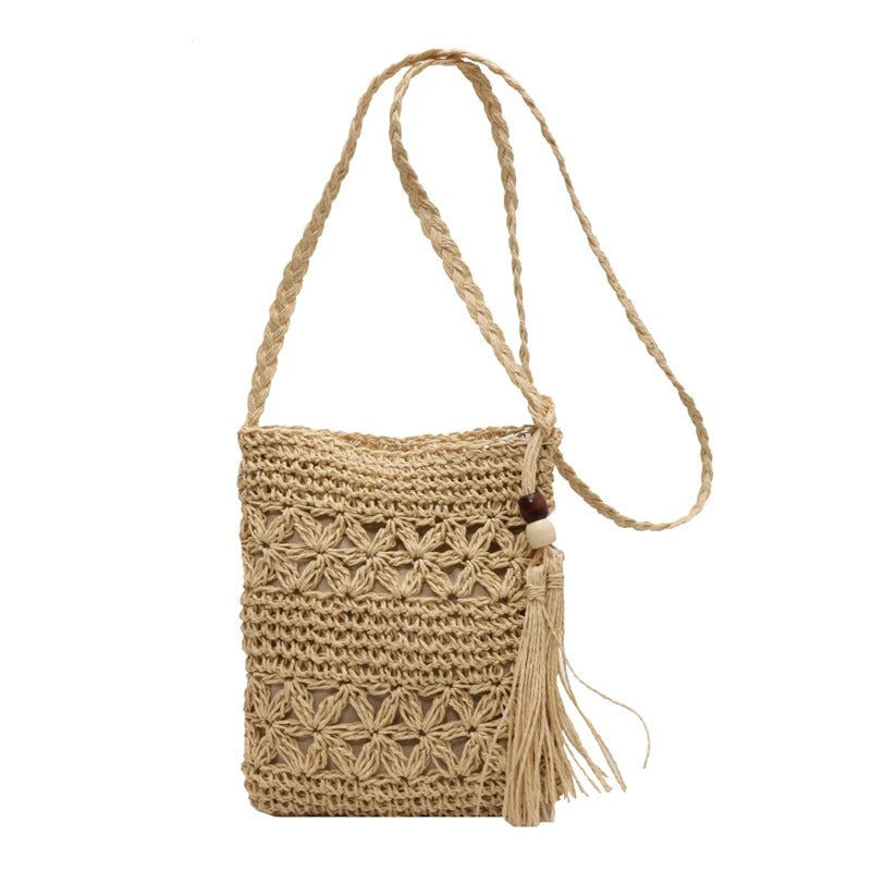Borsa Alma in rafia intrecciata con tracolla incrociata, l'accessorio ideale per l'estate