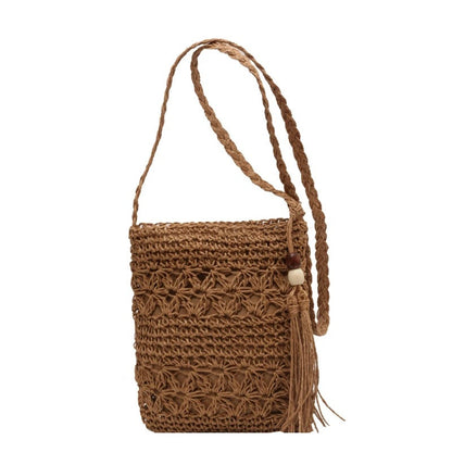 Borsa Alma in rafia intrecciata con tracolla incrociata, l'accessorio ideale per l'estate